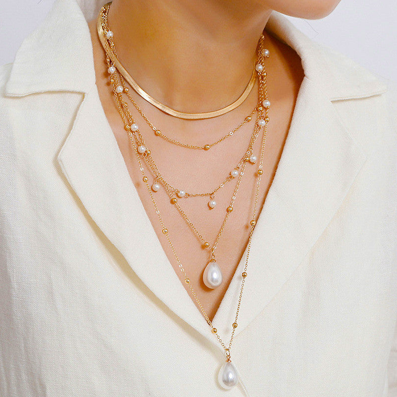 Multi-layer metal chain pearl imitation necklace